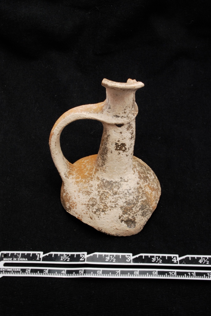 Basering Ware "Bilbil" jug. known for its dark color, very fine ware with a metallic ring to it, and shape (similar to poppy flower and thought to have possibly held opium) and thin neck, so when poured from, it makes the sound "bilbil".